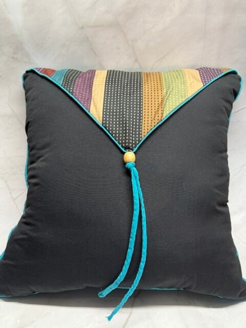 Decorative throw pillow w/striped flap & tassel